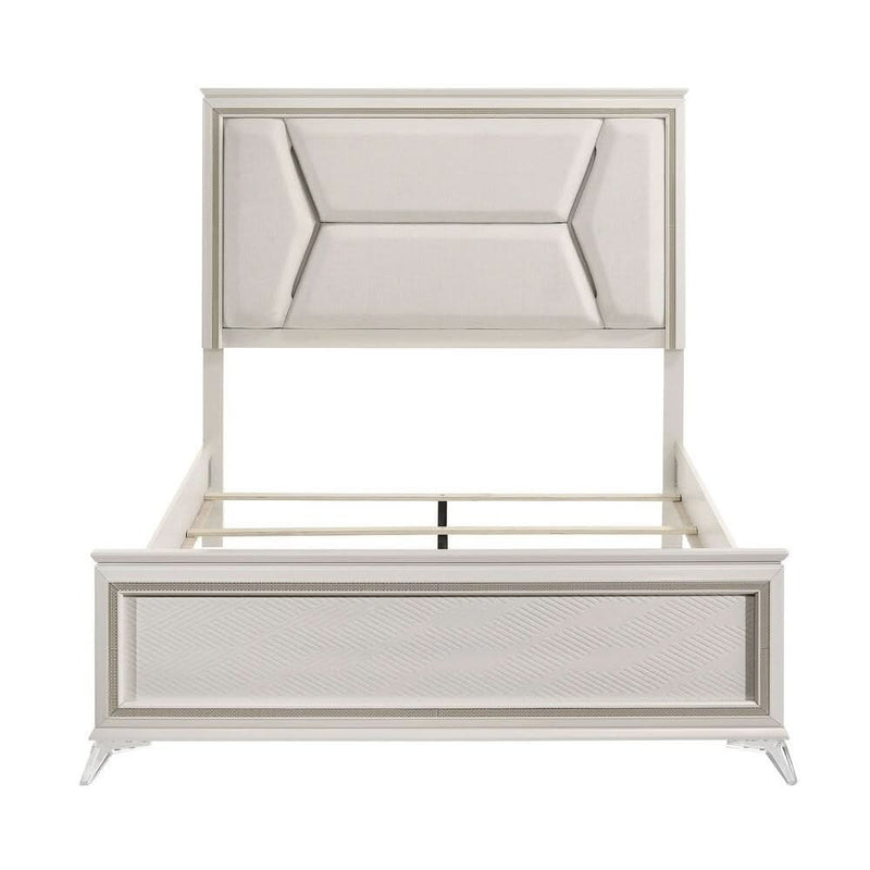 Wooden bedroom furniture with an antique white finish and gold accents, a modern luxury queen bed with an upholstered headboard and LED lighting