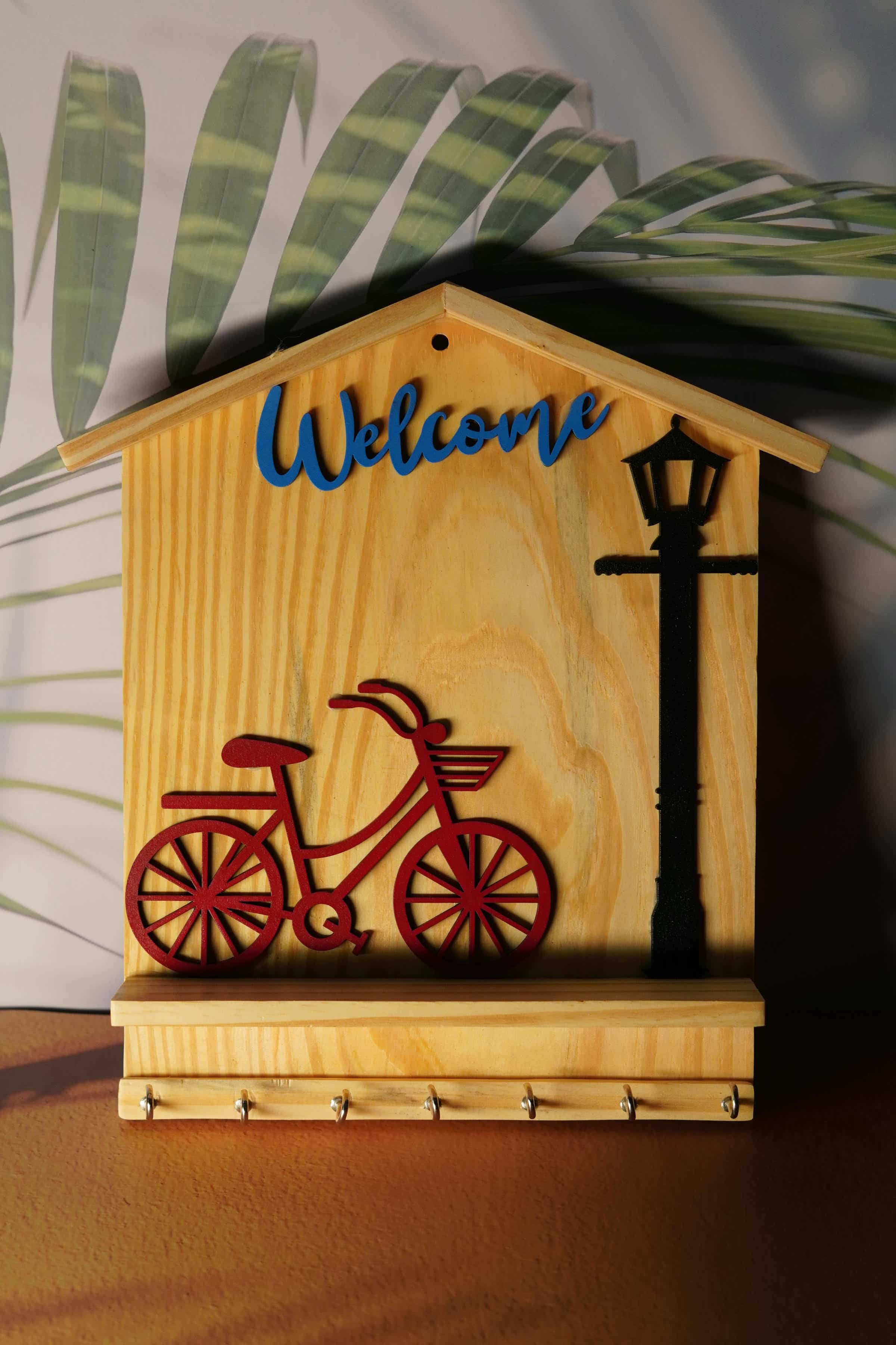 Rustic Wooden Key Holder with Bicycle and Streetlight Design