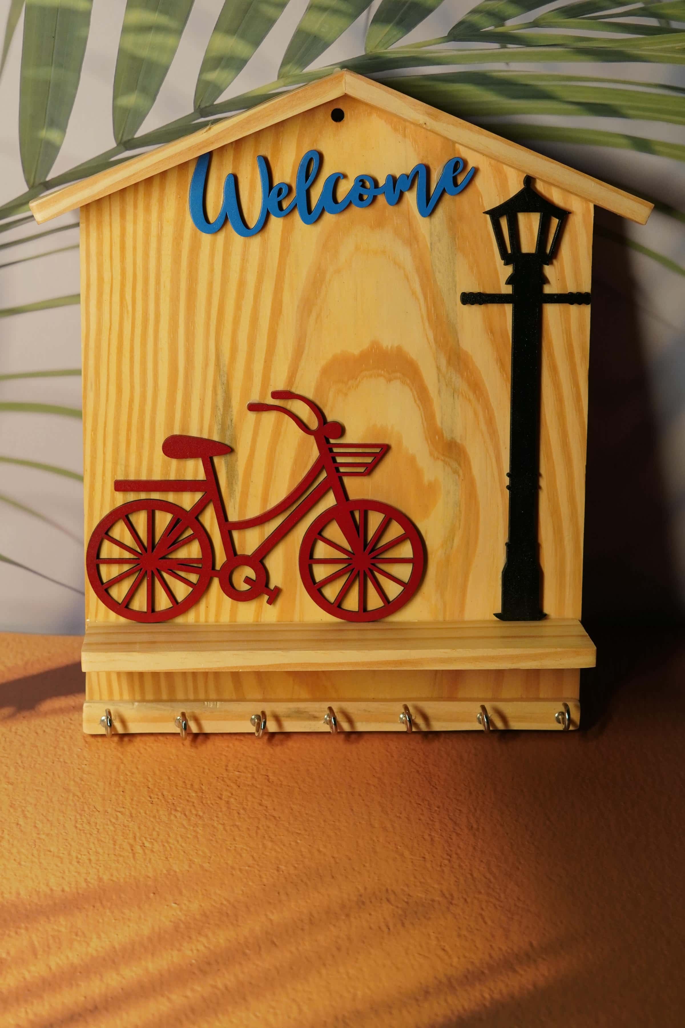 Rustic Wooden Key Holder with Bicycle and Streetlight Design